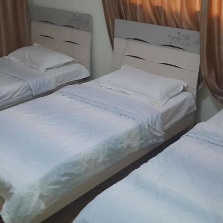 Qingdao Tianmanyi Hotel Bagian luar foto
