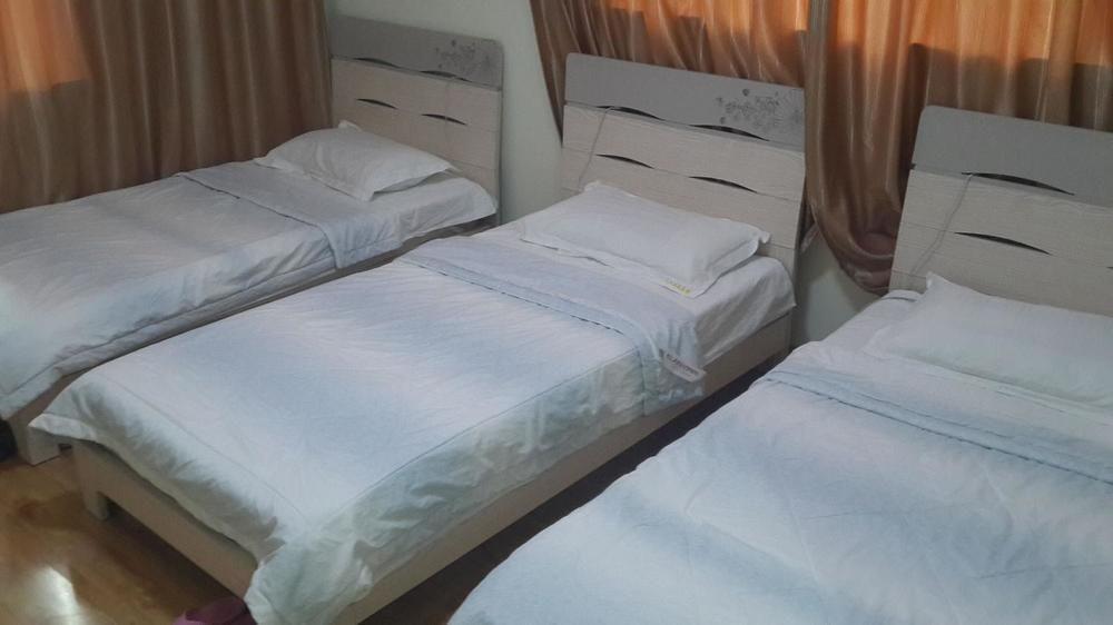 Qingdao Tianmanyi Hotel Bagian luar foto